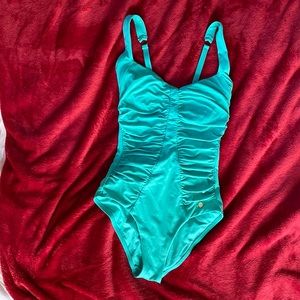 Turquoise one piece bathing suit in good condition